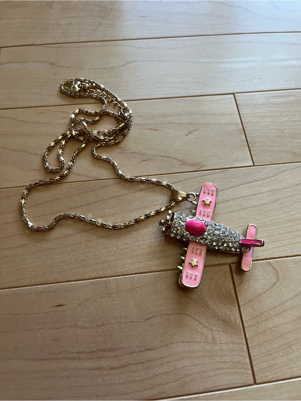 Betsey Johnson Gold-Tone Plane Pendant Necklace with Pink Enamel